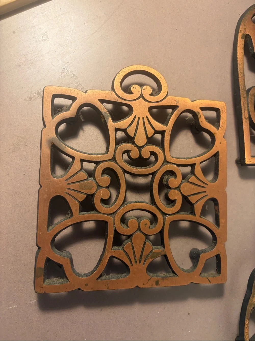 Pampered Chef Copper-Tone Decorative Cast Iron Trivets Set